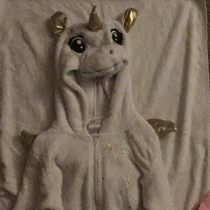 White and gold onesie